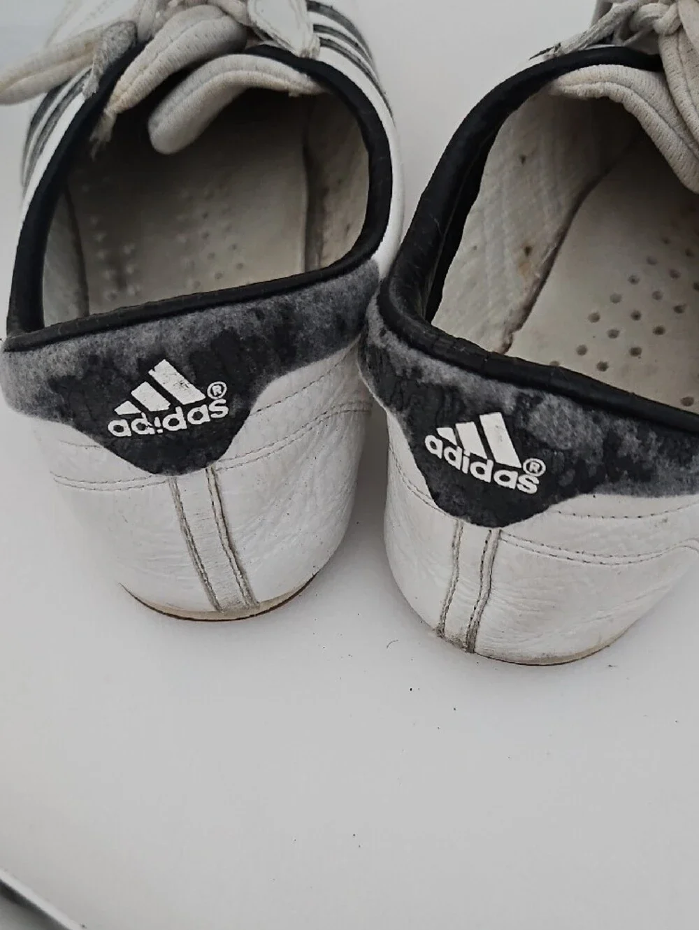 adidas Classic White Athletic Shoes with Black Stripes